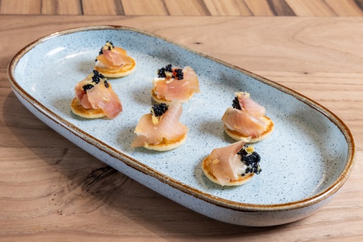 a piece of cake sitting on top of a wooden table
