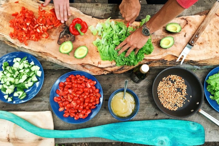 a bunch of food sitting on top of a wooden table